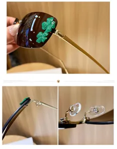 Gros plan de lunettes de soleil carrées en métal avec trèfle vert et verres dégradés.
