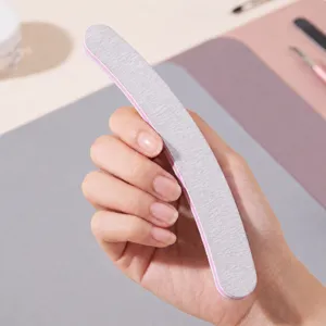 Professional double-sided nail file and emery board for professional home and salon manicure.