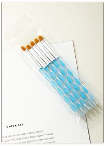Detail view of the 5-piece dual-ended nail dotting pen set in clear packaging, acrylic handles.