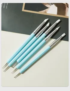 Dual-ended silicone nail art brushes and clay sculpting dotting pen set for precision crafting.