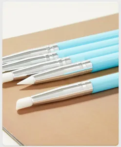 Silicone nail art sculpting pens set detail view with blue handles and soft tips for crafting.
