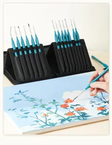 Detail paint brush set in black storage case, showcasing fine tip brushes for creative art work.