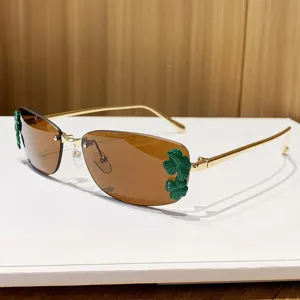 Femme lunettes de soleil carrete en metal avec decor trfle vert lunettes chic mode