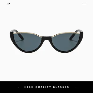 Schicke schwarze Katzenauge-Sonnenbrille mit goldenem Metall-Oberrand für stilvolle Damen.