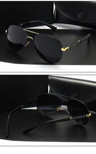 Detailansicht klassischer Aviator-Sonnenbrille, schwarz-goldener Metallrahmen mit UV-Schutz.