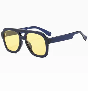 Lunettes de soleil carrées à double pont tendance avec verres jaunes pour hommes et femmes.