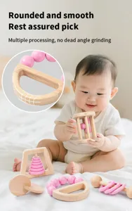 Wooden baby rattle detail showing smooth polished surface and safe beech wood for infants.