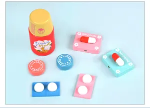 Wooden pretend play doctor medical toy set with simulation cough syrup bottle and pills.