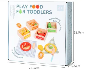 Wooden play food cutting set detail view showcasing colorful wooden fruit blocks and storage boxes.