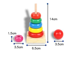 Wooden rainbow stacker toy detail showing dimensions, colorful stacking rings and base
