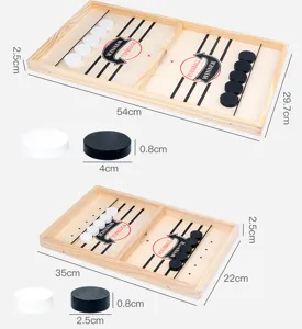 Wooden fast sling puck game size and dimension detail chart showing two board options.
