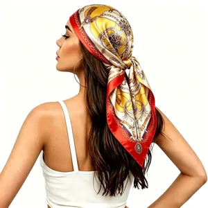 Detail shot showing luxury baroque chain print square headscarf worn by model gracefully.