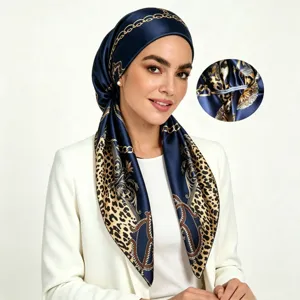 Women satin silk head scarf with leopard chain print, stylish Muslim hijab for daily wear.