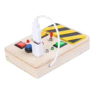 Wooden busy board sensory toy for toddlers, interactive learning board with switches and lights.