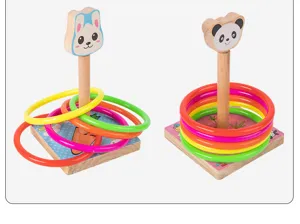 Close-up of wooden ring toss toy featuring cute animal pillars and vibrant colored plastic rings.