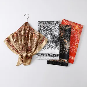 Detailed view of the 88cm satin paisley floral square scarf, smooth silky texture.