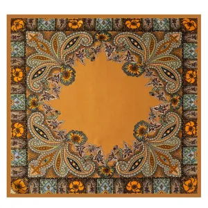 Close-up detail of vintage paisley floral silk scarf, retro brown orange aesthetic pattern.