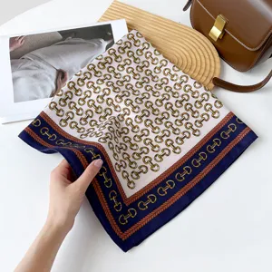 Elegant 70cm square silk scarf featuring a classic horsebit print and stylish contrast border design.