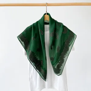 Green paisley large square scarf detail, elegant vintage retro style shawl headscarf.