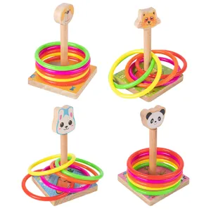 Wooden ring toss game for kids with cute cartoon animal tops and colorful rings main view