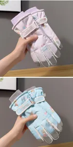 Detailed view of winter ski gloves with cute bear prints, touch screen fingertips, and cozy fleece.