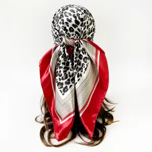Leopard print satin square scarf detail showcasing the stylish headscarf and drape effect.