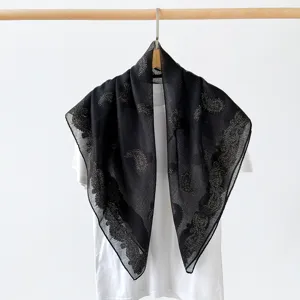 Detailed view of the black paisley pattern 90cm square scarf, elegant retro style.
