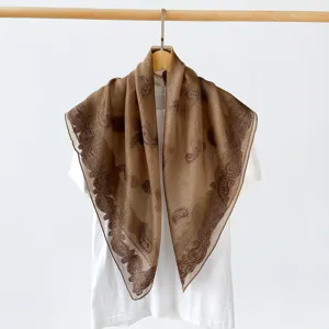 Detail view of the 90cm brown paisley square scarf, elegant retro silk shawl for summer wear.