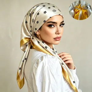 Satin silk scarf cap for women, elegant floral print head wrap with gold trim for summer sun protection.