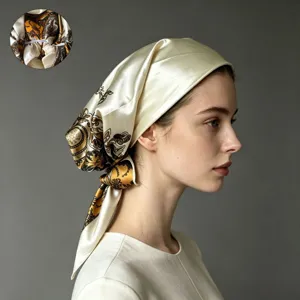 Satin paisley print headscarf detail view, stylish women sun protection hair bonnet hat.