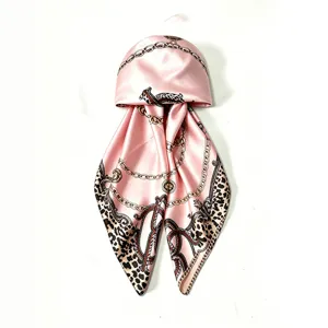 Pink silk satin hair scarf with chic chain and leopard print for women daily styling.