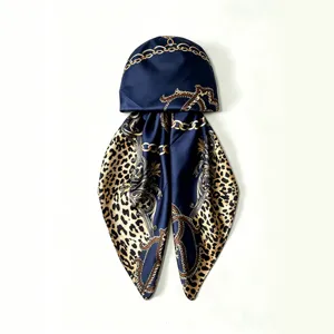 Blue silk satin headscarf with chain and leopard print, elegant women hair wrap accessory.