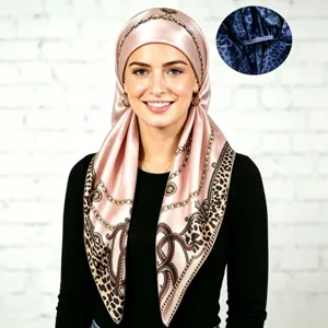 Satin silk hijab scarf for women, featuring elegant chain and leopard print design. Pink headscarf.
