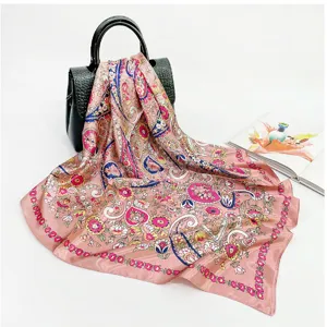 Pink paisley print satin square scarf detail, elegant floral pattern for women hair and neck styling.