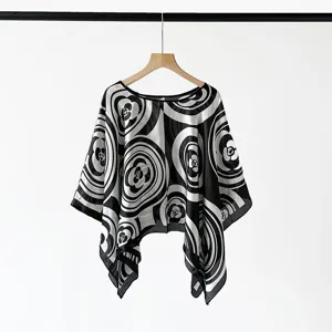 Black and white printed geometric pattern sheer poncho cape, stylish beach sun protection shawl.