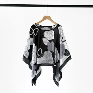 Black and white floral print pullover scarf shawl, elegant asymmetrical design detail view.