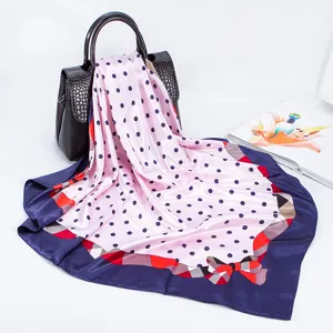 Elegant 90cm imitation silk square scarf with pink polka dots and chic bow border detail.