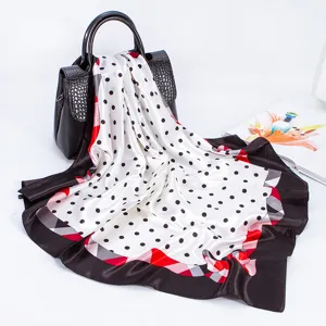 Elegant women's silk feel square scarf with classic polka dots and stylish plaid border design.