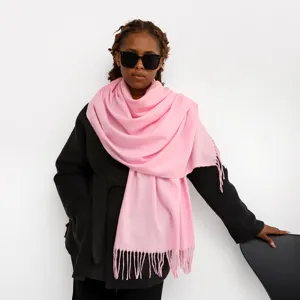 Elegant solid color pink cashmere-feel scarf with fringe, perfect for women winter daily wear.