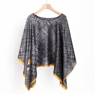 Black and white patterned pull-on scarf detail, elegant women shawl with yellow border trim.