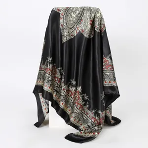 Elegant black satin square scarf featuring detailed paisley print, perfect neckerchief accessory.