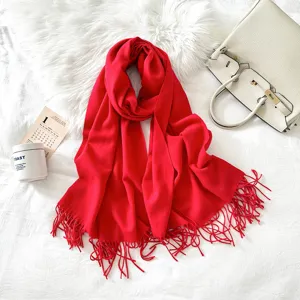 Solid color imitation cashmere long scarf in anchor red, cozy knit shawl with stylish fringe.