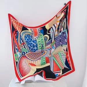 Exquisite 90cm printed silk square scarf featuring vibrant abstract geometric artistic patterns.