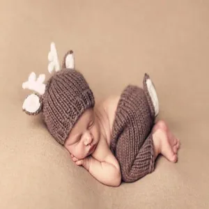 Newborn baby crochet deer photo prop set detail in brown handmade knitwear clothing cute style.
