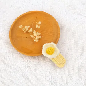 Handmade crochet hair clip, cute yellow and white floral design, sweet everyday accessory.