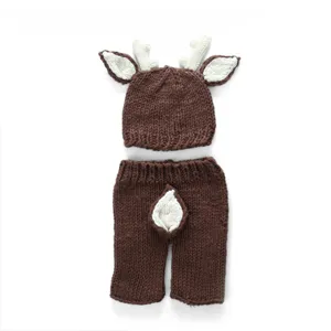 Handcrafted brown deer baby photography prop set, including knitted hat and tail shorts.