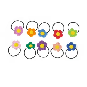 Handcrafted crochet flower hair ties set, colorful yarn hair elastics for daily wear styling.