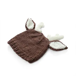 Detailed shot of brown knitted baby hat featuring cute white deer antlers and ears design.