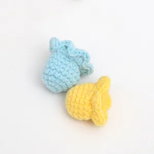 Handmade crochet lily of the valley flowers, knitted wool floral DIY accessories for crafts.