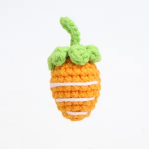 Handmade crochet carrot plush pendant detail view, cute knitted keychain accessory for bags.